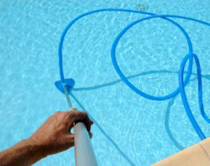 Pool Cleaning Sweeper in Pool